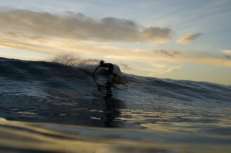 Harrison Roach traverses further out on the oily shoulder than a finned board could go. The next day he was riding deeper in the tube than a finned board could. The alaia is amazing!!!