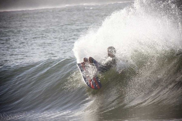 Isaac proves tThey work with a beautiful carve during the Noosa Festival of surfing finless demo heat 2009